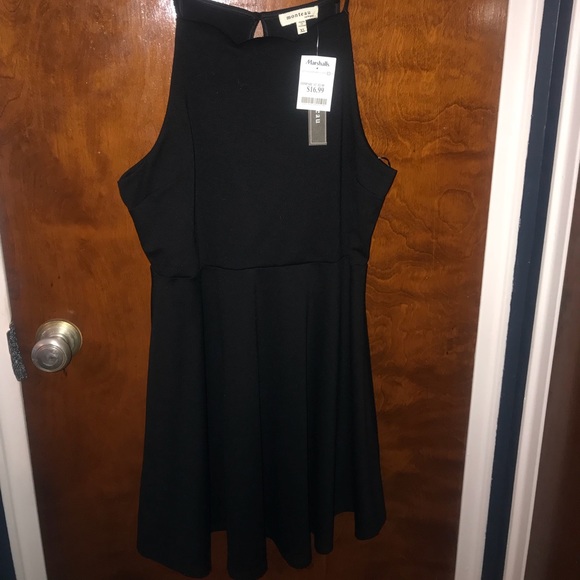 black dress with scalloped neckline